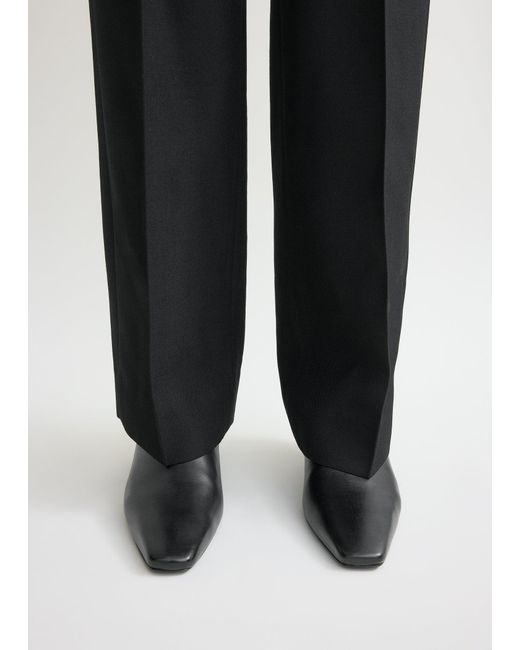 Totême  Black Leather Mid-Heel Boots
