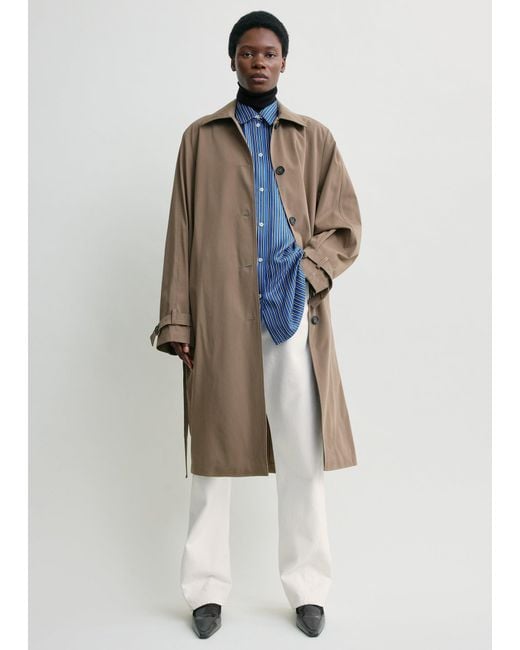 Totême White Light Spring Trench