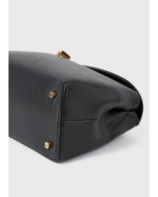 Totême Black T-Lock Leather Clutch