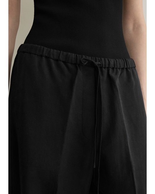 Totême Black Fluid Drawstring Trousers
