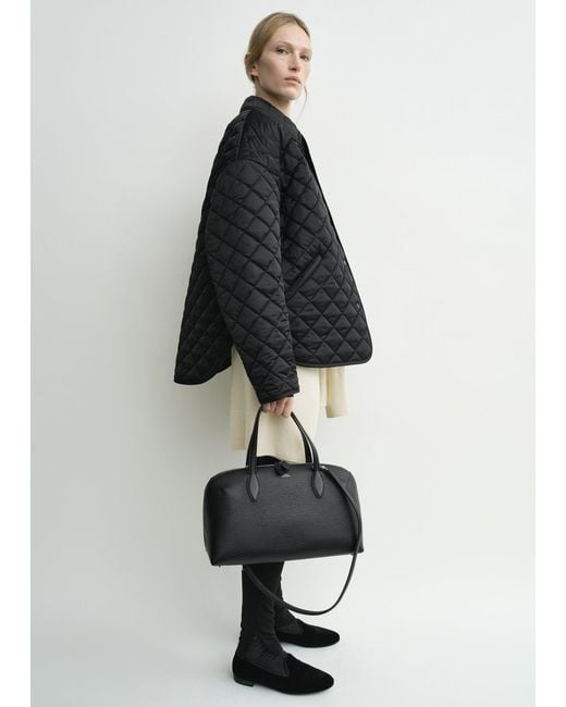 Totême Black Collared Quilted Jacket