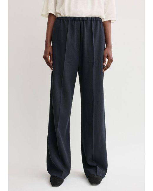 Totême Blue Fluid Winter Trousers