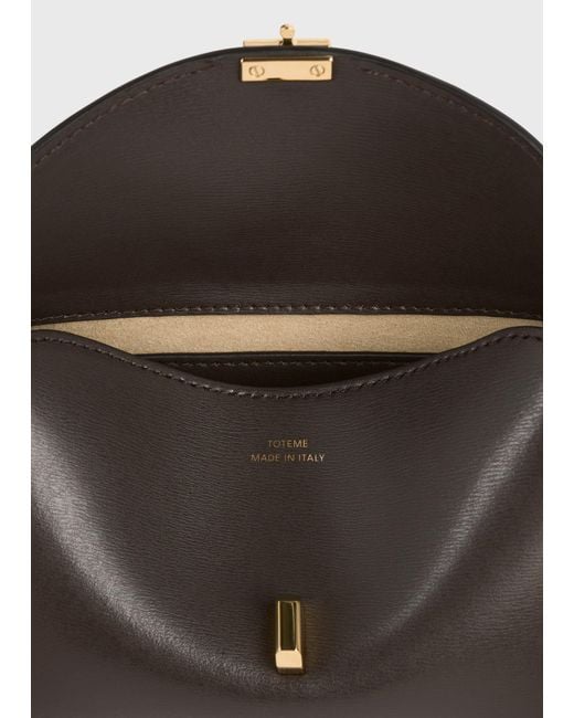 Totême White Mini T-Lock Leather Clutch