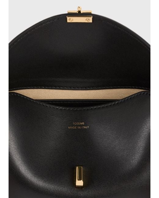 Totême White Mini T-Lock Leather Clutch