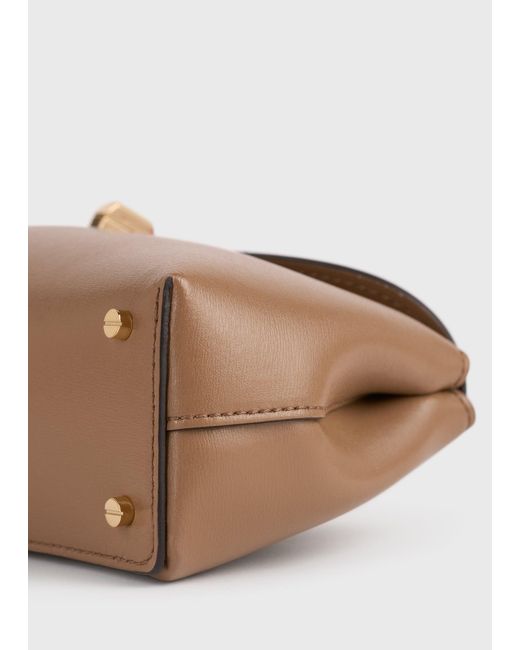 Totême White Mini T-Lock Leather Clutch