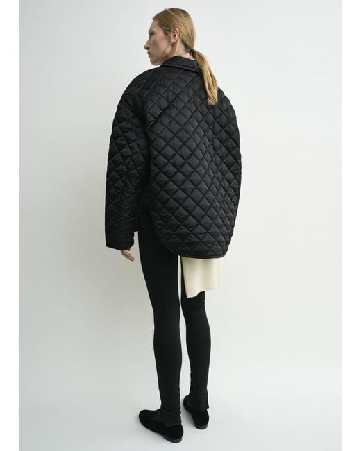 Totême Black Collared Quilted Jacket
