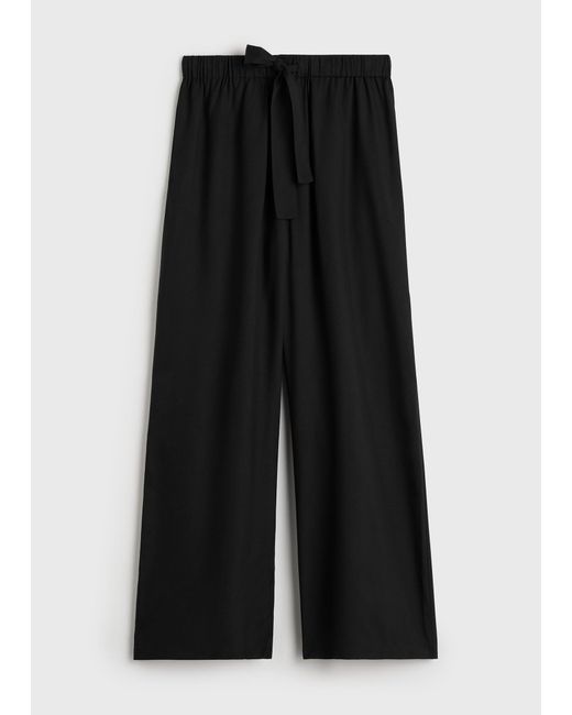 Totême Black Piped Silk Trousers