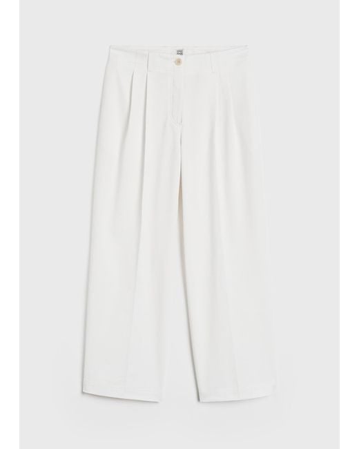 Totême Natural Relaxed Chino Trousers
