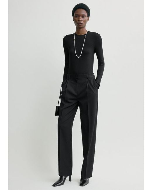 Totême Black Pleat Trousers
