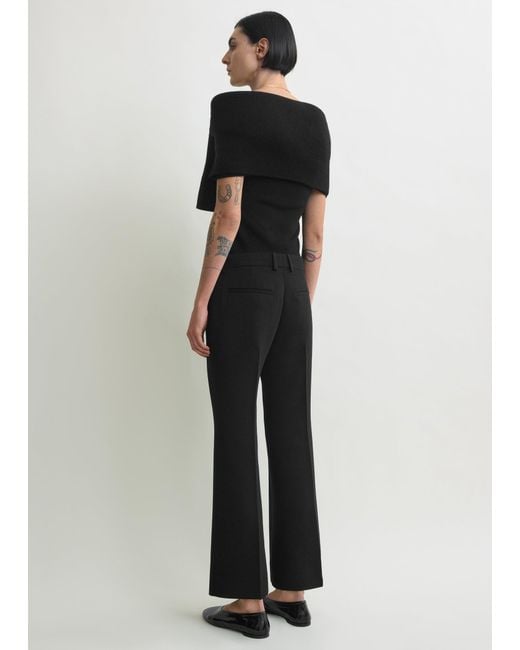 Totême  White Kick Flare Trousers