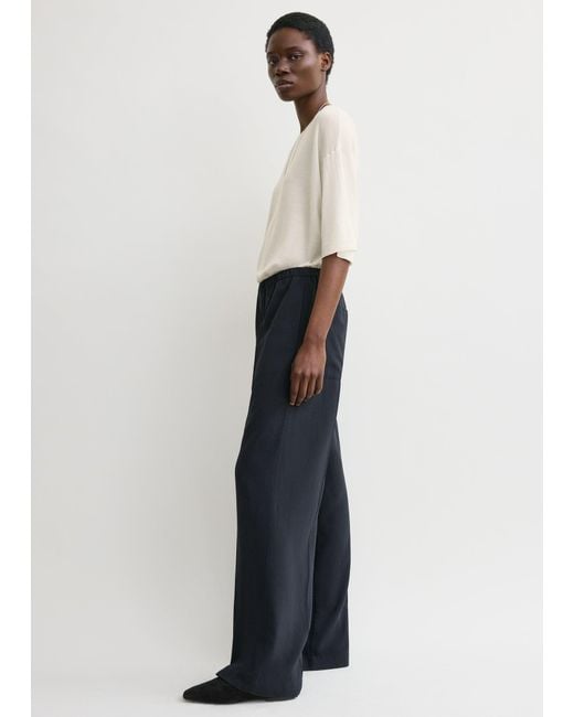 Totême Blue Fluid Winter Trousers