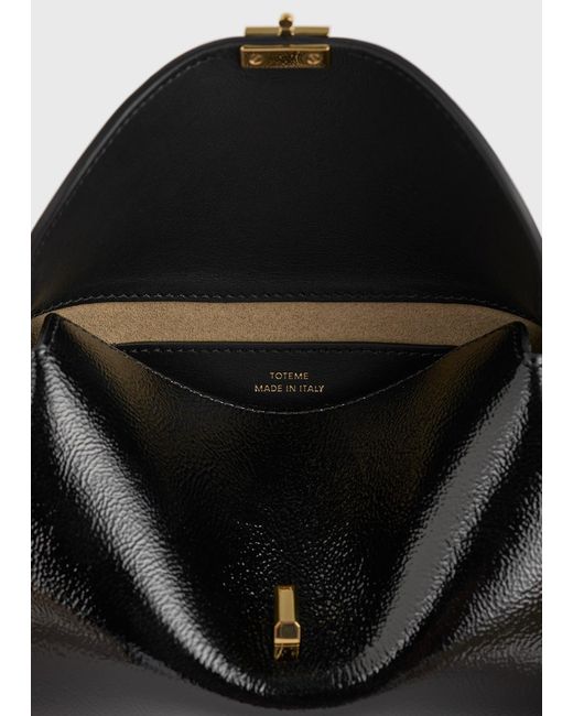 Totême White Mini T-Lock Naplack Clutch