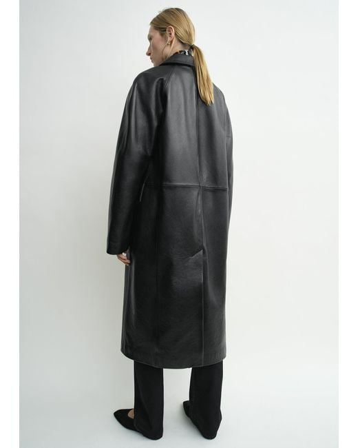 Totême Black Raglan Leather Coat