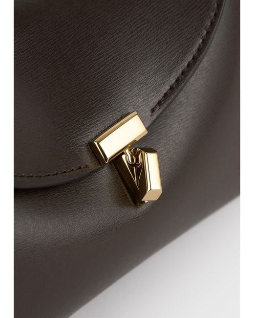 Totême White Mini T-Lock Leather Clutch