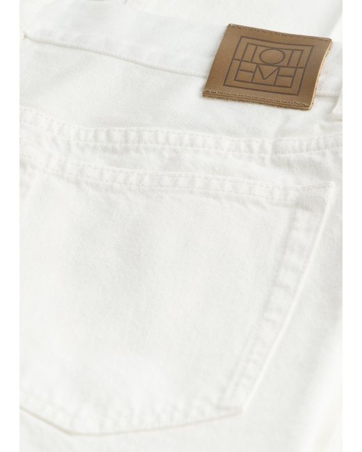 Totême White Kick Flare Denim