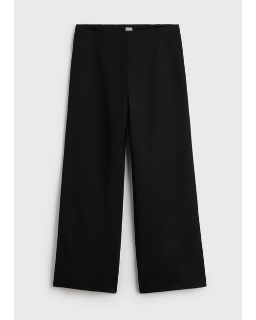 Totême  Black Fluid Satin Trousers