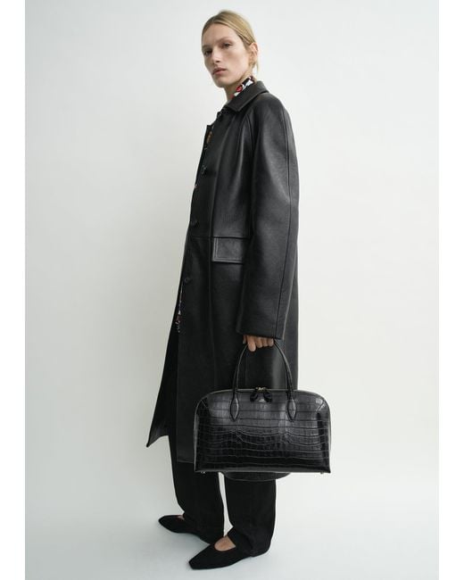 Totême Black Raglan Leather Coat