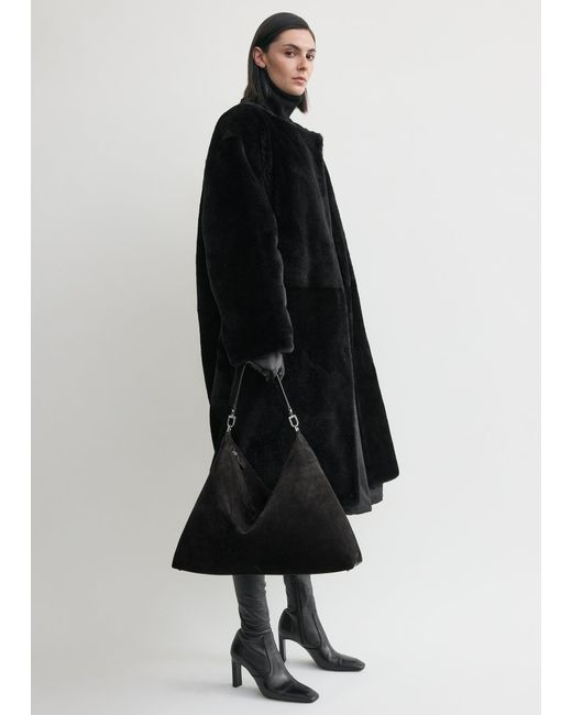 Totême  Black Bevel Suede Bag