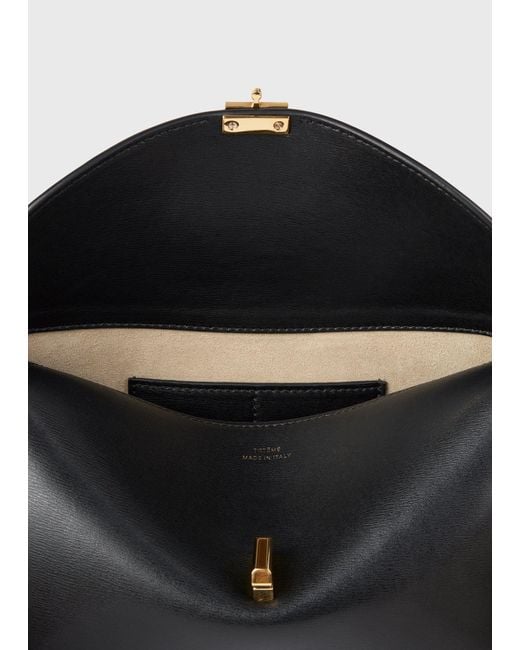Totême Black T-Lock Leather Clutch