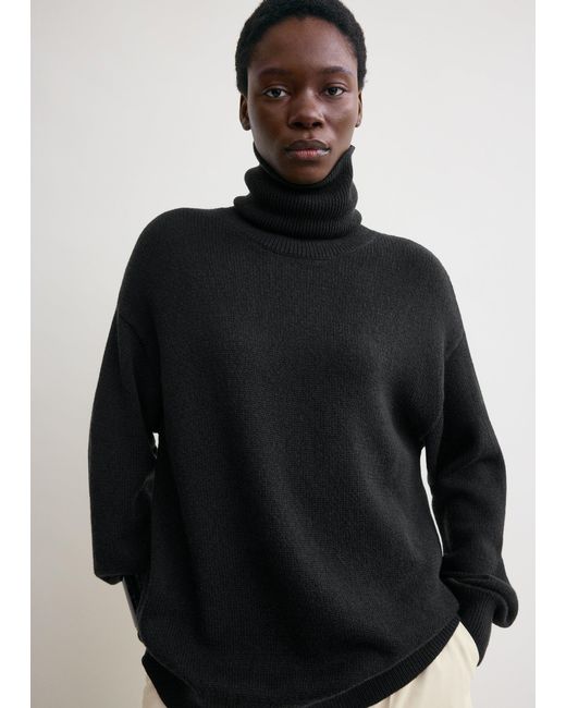 Totême Black Longline Turtleneck