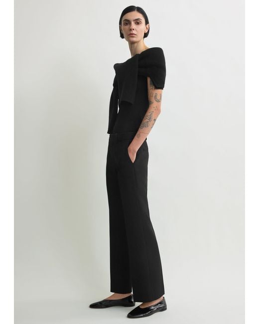 Totême  White Kick Flare Trousers