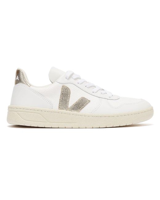 women's white and gold trainers