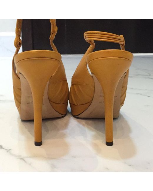 mustard yellow pumps