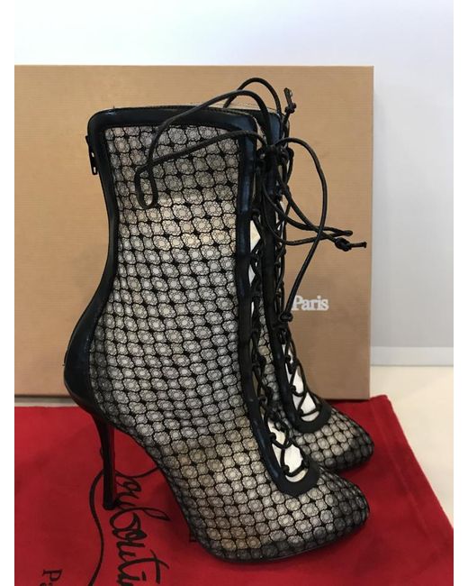 christian louboutin fishnet boots