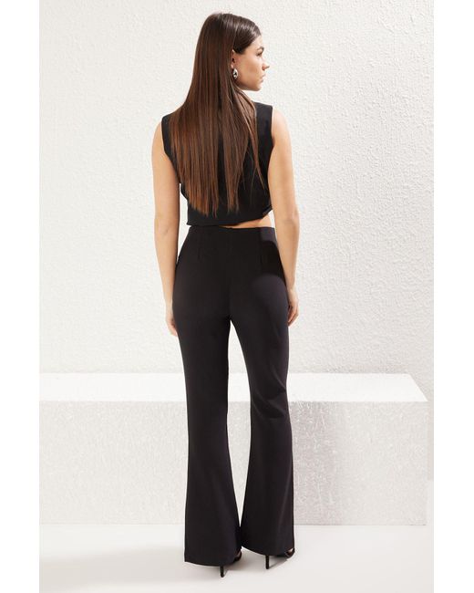 Trendyol Black Schwarze, Flexible, Ausgestellte Webhose Mit Elastischem Bund Auf Der Rückseite Für Damen