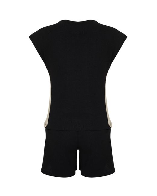 Trendyol Black Schwarz-ecrufarbenes pyjama-set aus geripptem baumwoll-farbblock-strick