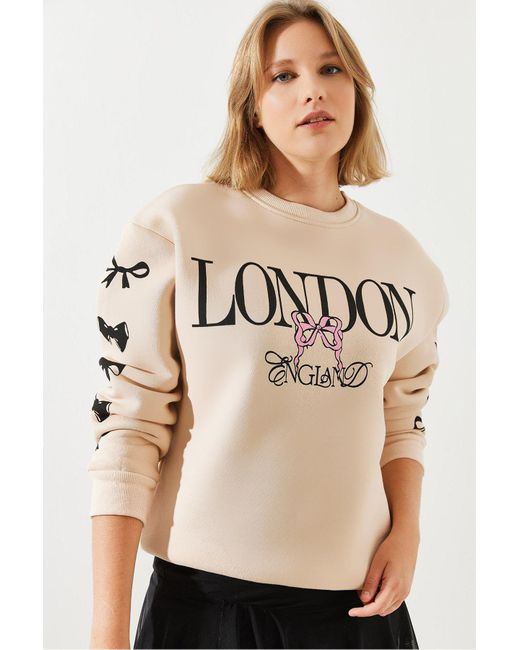 Bianco Lucci Natural Three Thread Raised London Life Grafik Bedrucktes Sweatshirt Mbhs004 Für Damen
