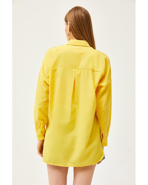 Olalook Yellow Es gewebtes hemd mit kragen und schmucksteinen auf der vorderseite, sechs ovale motive,