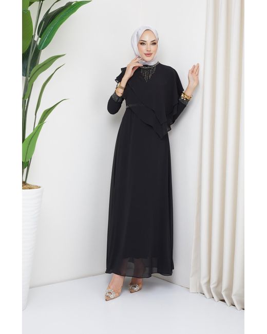 Olcay Black Abendkleid aus chiffon mit hijab und steinen sowie schwungraddetails,