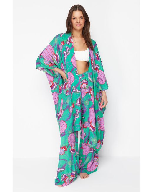 Trendyol Blue Tropisch gemusterter, gewebter maxi-kimono und kaftan mit gürtel