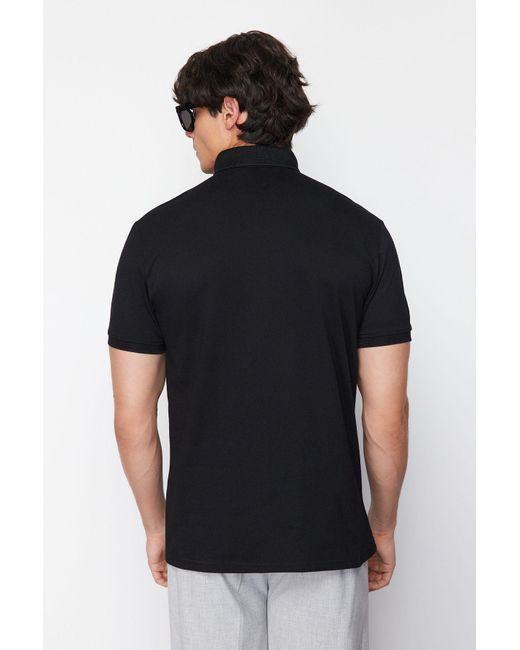 Trendyol Es t-shirt mit polokragen im regulären/normalen schnitt in Black für Herren
