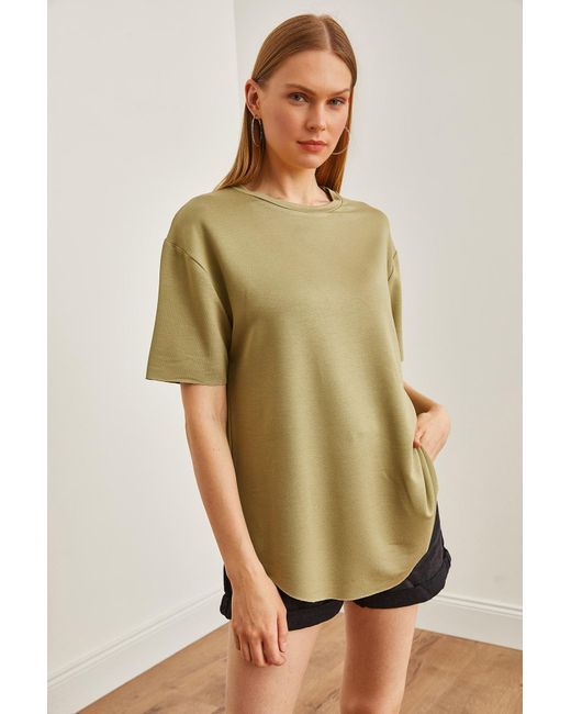 Olalook Green Farbenes t-shirt aus modal mit knöpfen , weiche textur, sechs ovale motive,