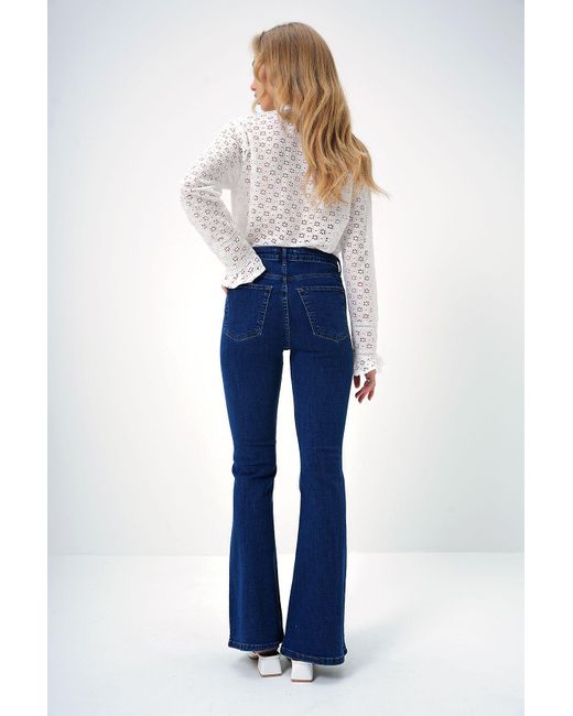 Trend Alaçatı Stili Blue Marineblaue Jeanshose Mit Hoher Taille Und Gewaschenem Spanischem Bein Für Damen