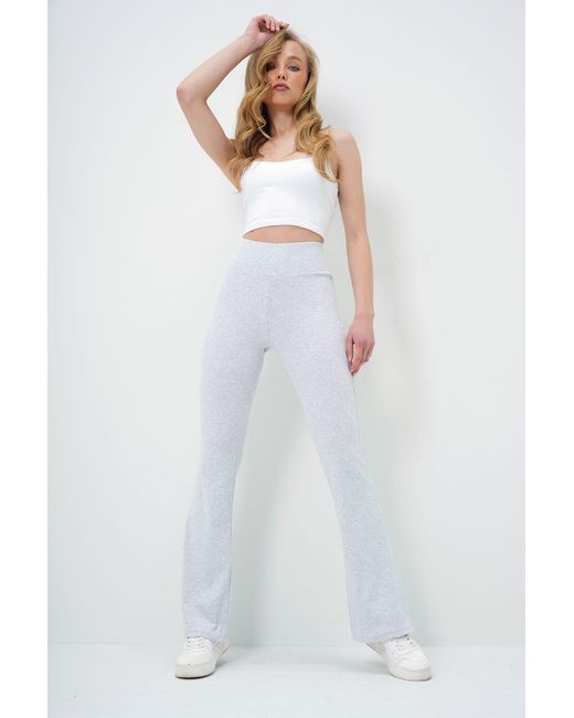 Trend Alaçatı Stili White Leggingshose Grimelange Mit Breitem Gürtel Aus Modalstoff Mit Ausgestelltem Bein Für Damen
