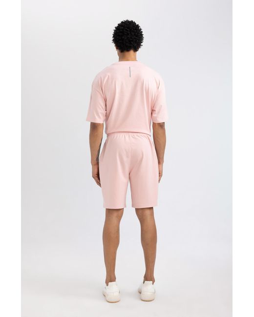 Defacto Fit slim fit shorts mit kurzem bein in Pink für Herren