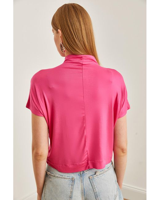 Olalook Pink Fuchsiafarbene, fließende bluse mit stehkragen und fledermausärmeln