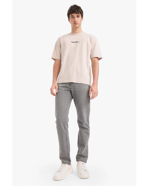 Defacto Keith Haring Comfort Regular Fit Bequeme Passform Rundhalsausschnitt Rückenbedrucktes Kurzarm-T-Shirt Z7012Az25S Für Herren in Blue für Herren