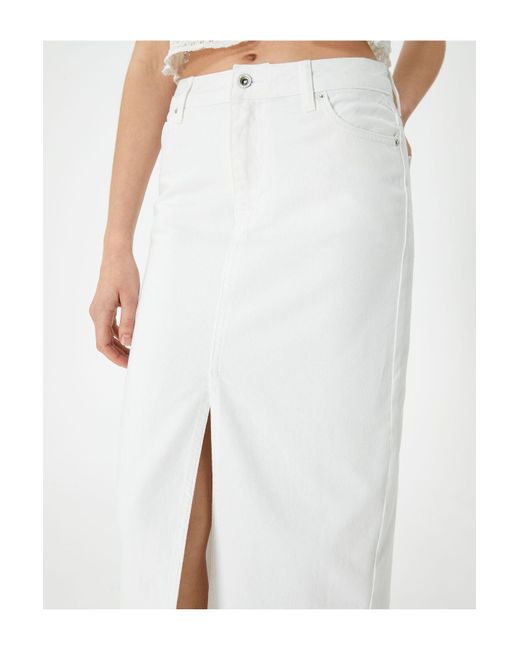 Koton White Langer jeansrock mit schlitzdetail vorne, hohe taille, tasche, bequeme passform