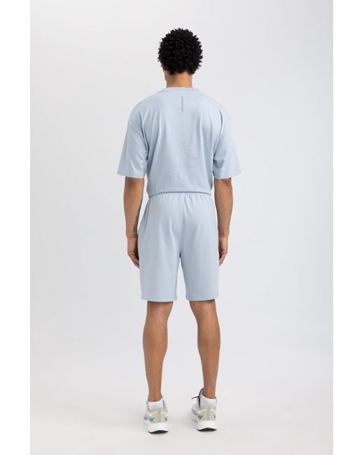 Defacto Fit slim fit shorts mit kurzem bein in Blue für Herren