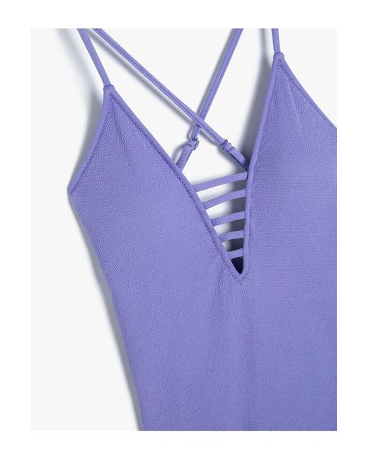 Koton Purple Badeanzug mit strukturierten trägern, tiefer v-ausschnitt und paspelierung
