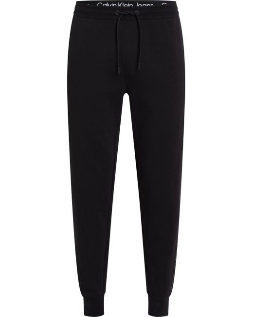 Calvin Klein E jogginghose mit logo-streifen und schriftzug auf den seitennähten j3 in Black für Herren