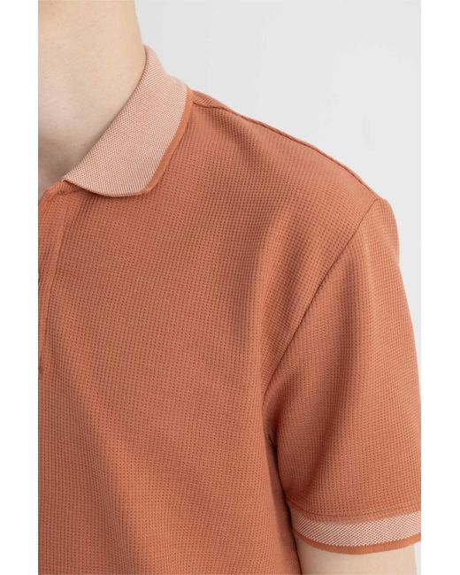 Defacto Neues polo-t-shirt mit normaler passform und kurzen ärmeln in Orange für Herren