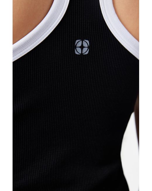Trendyol Black Nahtloses, es, gestricktes sporttop/bluse mit neckholder und reflektor-print