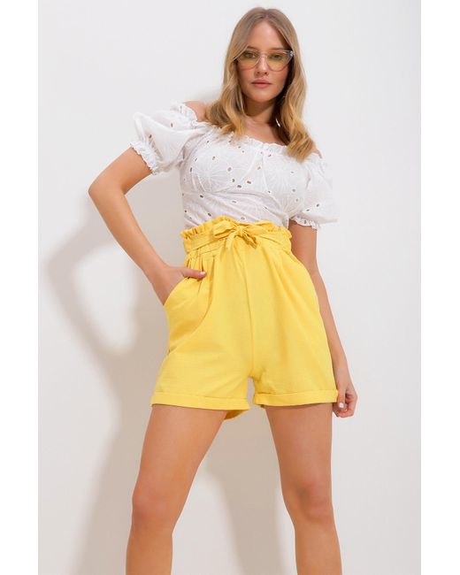 Trend Alaçatı Stili Yellow E shorts mit doppeltem bein und taillenschnürung