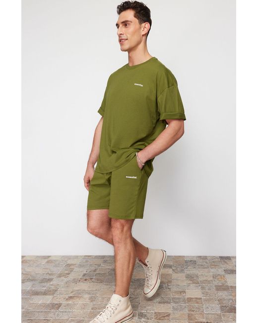 Trendyol Farbenes trainingsanzug-set mit übergroßem textaufdruck, 100 % baumwolle, in Green für Herren