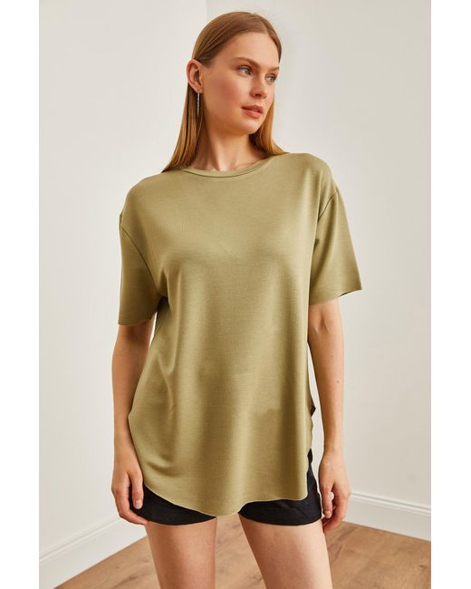 Olalook Green Farbenes t-shirt aus modal mit knöpfen , weiche textur, sechs ovale motive,